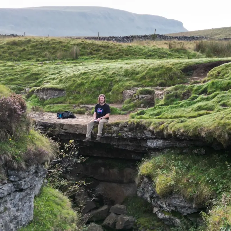 James Sheriff sat on a rock